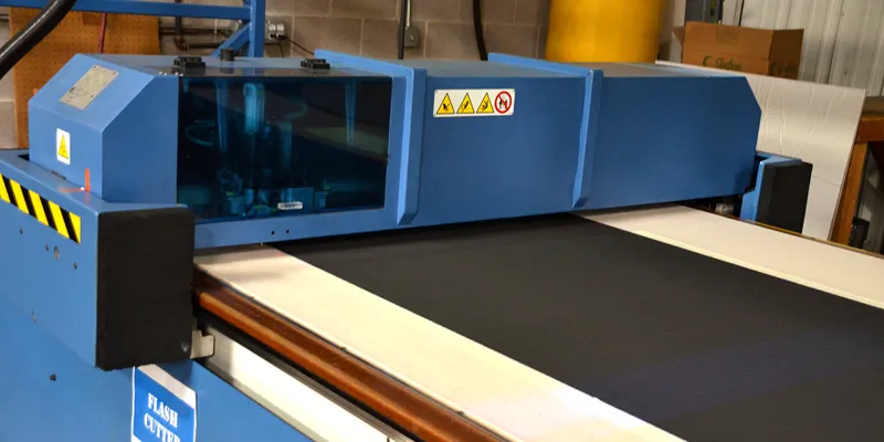 A digital die cutting machine, or dieless cutting machine, quickly producing a short batch of parts for testing a proof of concept.