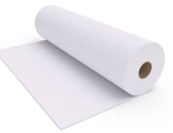 Roll of white paper resting on a flat sheet of the same material, against a white background.
