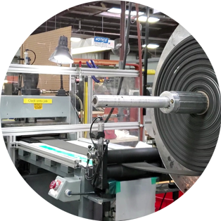 PRECO Die-Cutting Press with Roll of PSA Laminated Foam
