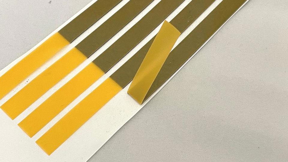 Die-cut 3M VHB foam tape with adhesive liner pull tabs.jpg