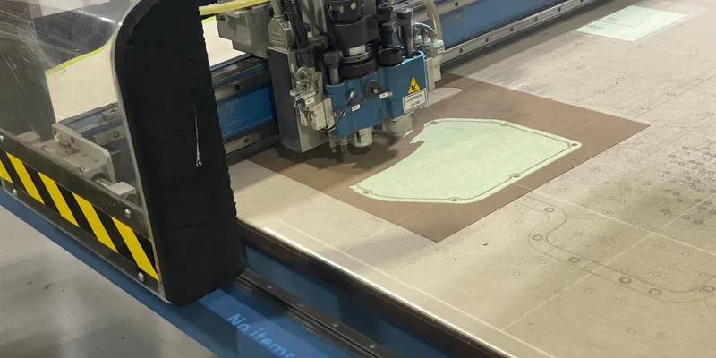 A digital die cutting machine, or dieless cutting machine, quickly producing parts.