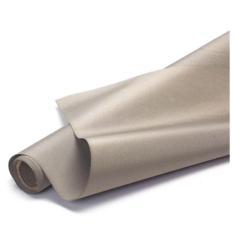 Rolled beige fabric on a white background.